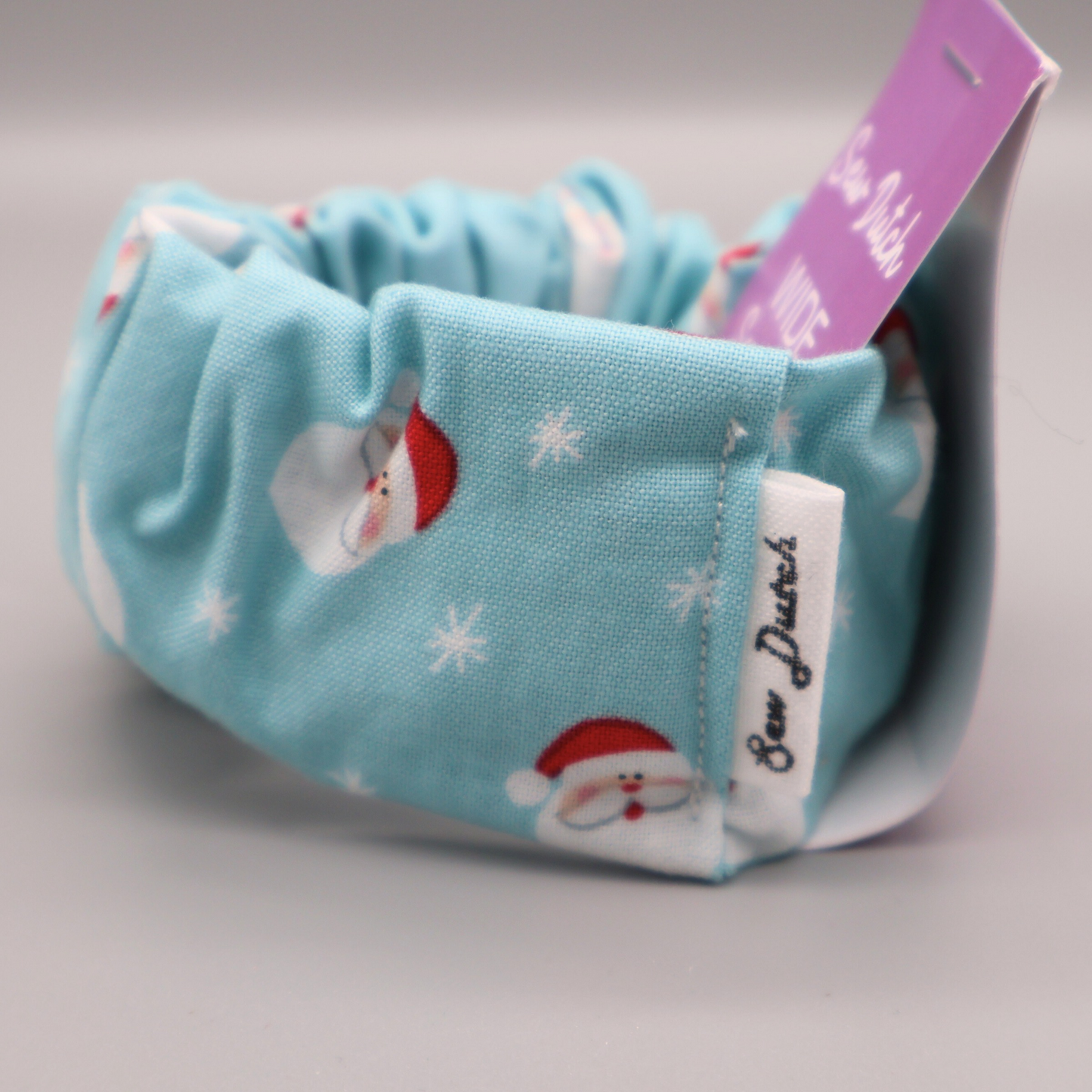 Wide elastic light blue Santa scrunchie