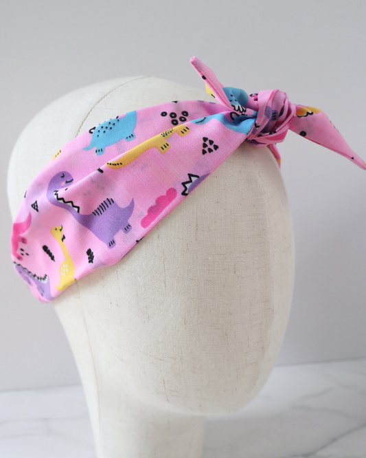 Retro Knotted Headband Pink Dinosaurs