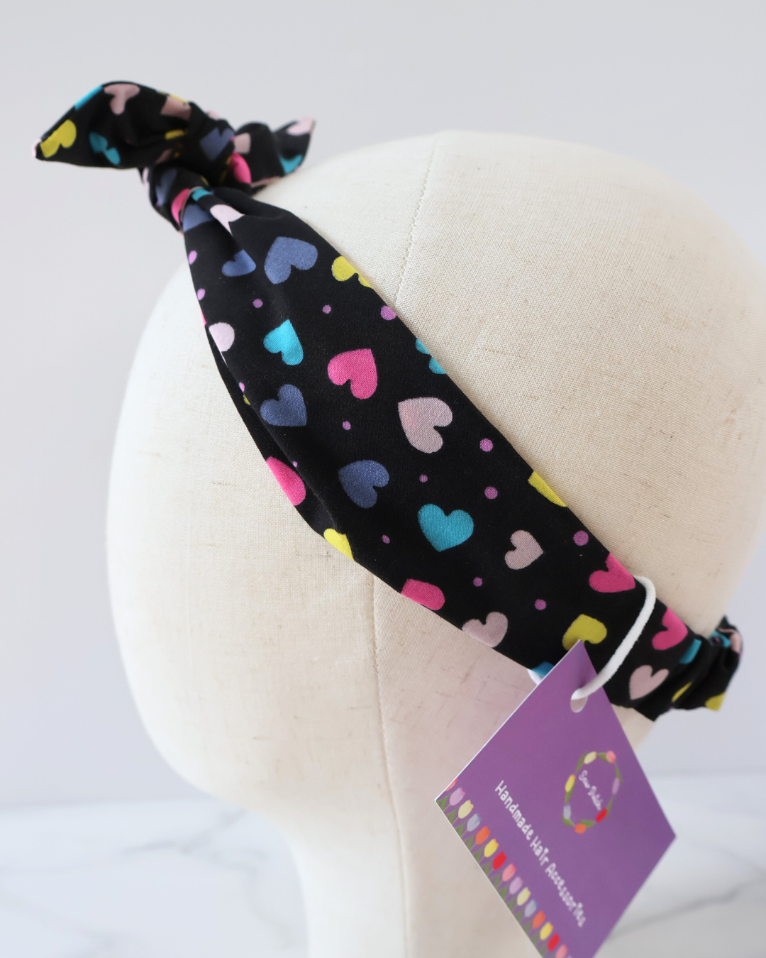 Retro Knotted Headband Multi Hearts Black