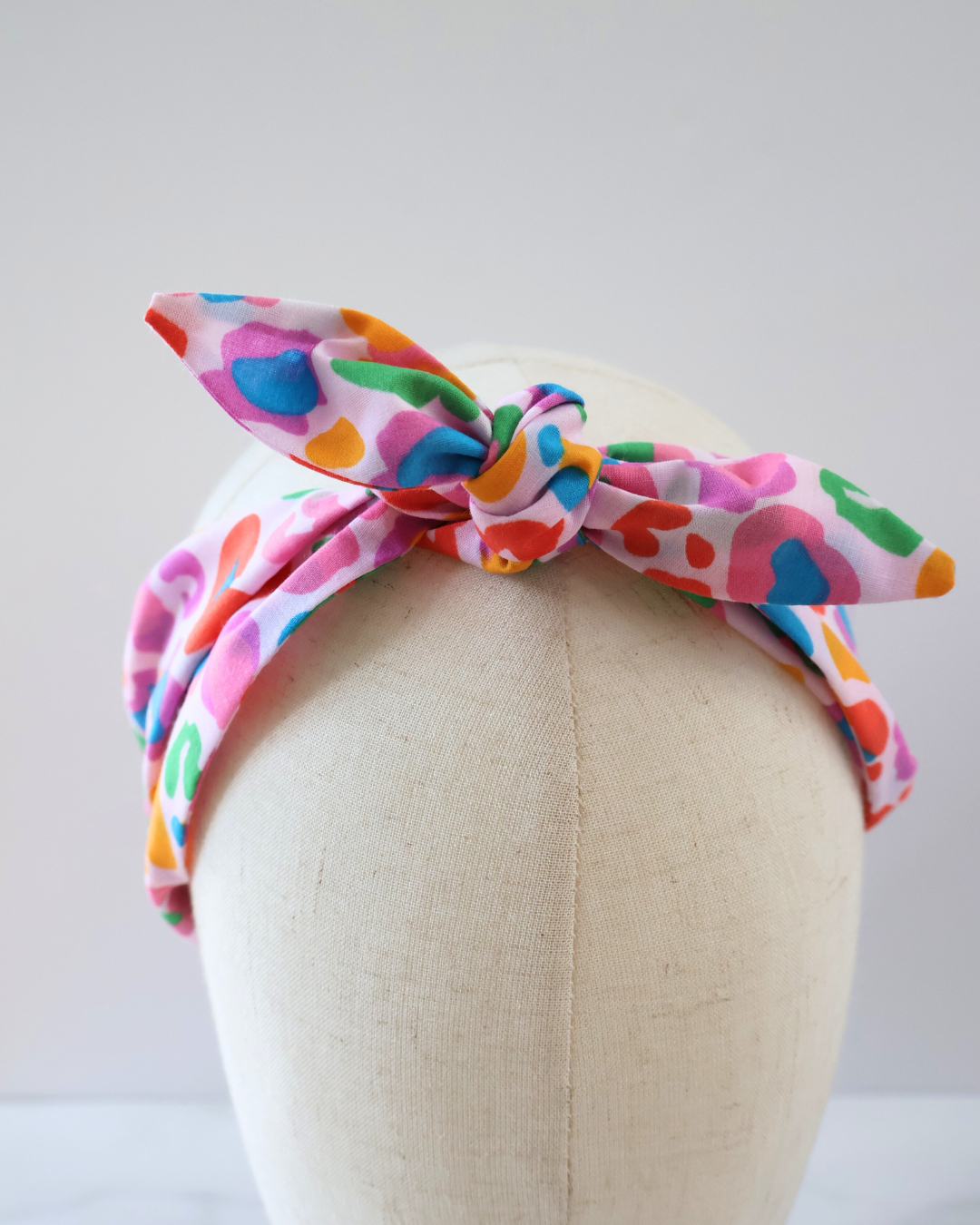 Retro Knotted Headband Leopard Rainbow Pink